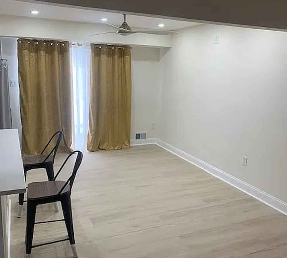 Light flooring installation in finished interior room